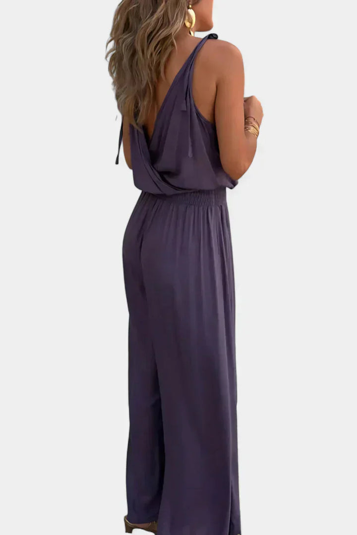 Backless Jumpsuit with Gold Accents and Crossover Neckline