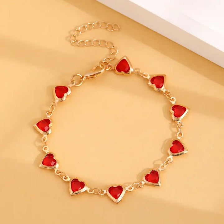 Gold Bracelet with Garnet Accents | Elegant Everyday Jewelry