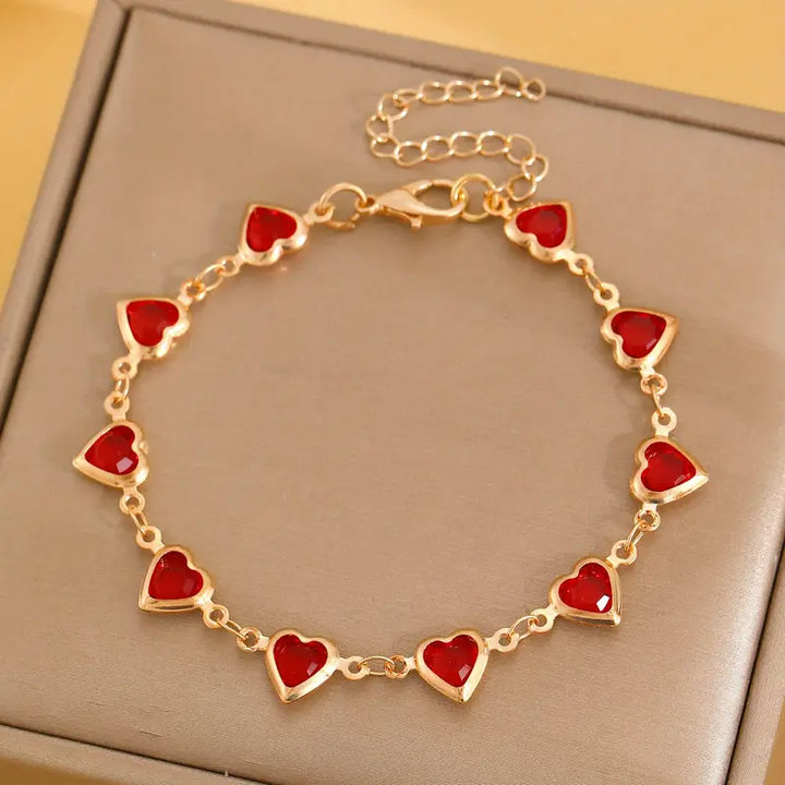 Gold Bracelet with Garnet Accents | Elegant Everyday Jewelry