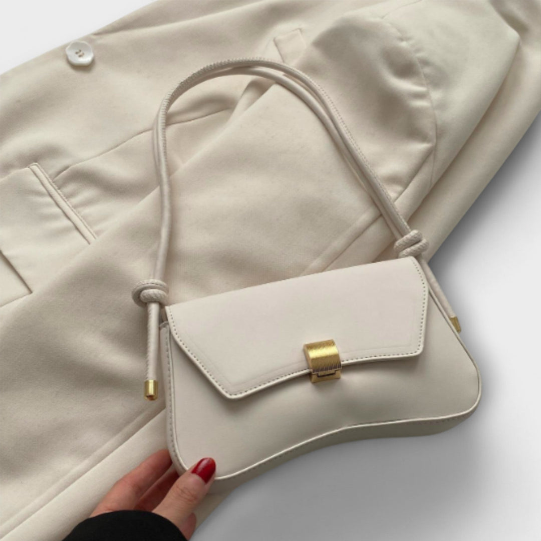 Vintage Leather Handbag with Classic Clasp Closure