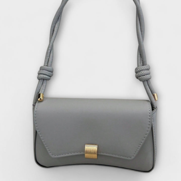 Vintage Leather Handbag with Classic Clasp Closure