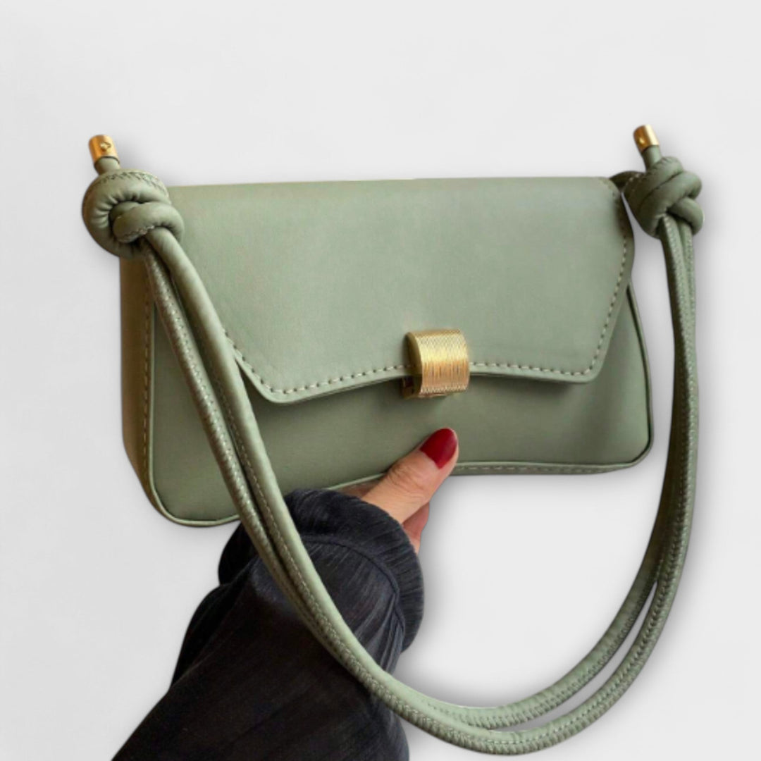 Vintage Leather Handbag with Classic Clasp Closure
