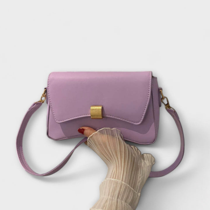 Vintage Leather Handbag with Classic Clasp Closure